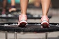 Fitness women jumping on small trampolines Royalty Free Stock Photo