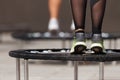 Fitness women jumping on small trampolines Royalty Free Stock Photo