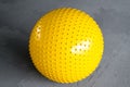 Fitness on wooden floor. Sports balls. Yoga ball in fitness room.Exercise yellow color ball in fitness, gym equipment and fitness Royalty Free Stock Photo