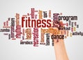 Fitness word cloud and hand with marker concept Royalty Free Stock Photo