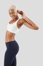 Fitness workout, smiling woman stretching arms and back, african latin american female athlete in sportswear, Sportswoman do Royalty Free Stock Photo