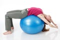 Fitness Workout. Sporty Woman Doing Bicycle Crunch Abs Exercise Lying On Floor Over Pink And Blue Neon Studio Background Royalty Free Stock Photo