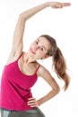 Fitness Workout. Sporty Woman Doing Bicycle Crunch Abs Exercise Lying On Floor Over Pink And Blue Neon Studio Background Royalty Free Stock Photo