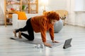 Fitness Workout training. Young healthy fit african girl doing sports exercise on yoga mat on floor at home. Athletic Royalty Free Stock Photo