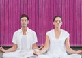 fitness yoga couple with pink wood background Royalty Free Stock Photo