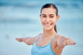 Fitness, yoga and face of woman by beach with warrior pose for wellness, healthy body and energy. Sports, nature and Royalty Free Stock Photo