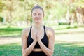 Fitness, yoga and woman in park for meditation to relax for exercise, mindfulness training and workout. Motivation