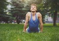 Man training yoga in cobra pose outdoors Royalty Free Stock Photo