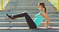 Fitness young woman doing exercises in the city park Royalty Free Stock Photo