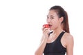 Fitness young woman eating apple. Royalty Free Stock Photo