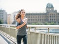 Fitness young woman jogging in the city Royalty Free Stock Photo