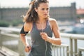 Fitness young woman jogging in the city Royalty Free Stock Photo