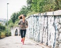 Fitness young woman jogging in the city park Royalty Free Stock Photo