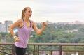 Fitness young woman jogging in the city park Royalty Free Stock Photo