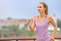 Fitness young woman jogging in the city park Royalty Free Stock Photo