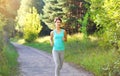 Fitness young woman running in park, female runner workout, sport and healthy lifestyle Royalty Free Stock Photo