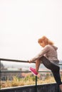 Fitness young woman stretching outdoors Royalty Free Stock Photo