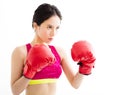 Fitness young woman wearing red boxing gloves Royalty Free Stock Photo