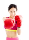 Fitness young woman wearing red boxing gloves Royalty Free Stock Photo