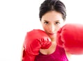 Fitness young woman wearing red boxing gloves Royalty Free Stock Photo