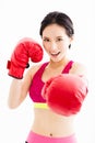 Fitness young woman wearing red boxing gloves Royalty Free Stock Photo