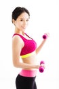 Fitness young woman working out with dumbbells Royalty Free Stock Photo