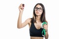 Fitt girl holding measuring tape and writing Royalty Free Stock Photo