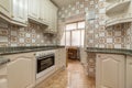 A fitted kitchen with granite worktops