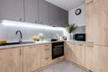 Fitted kitchen in small new apartment Royalty Free Stock Photo