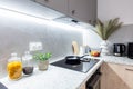Fitted kitchen in small new apartment Royalty Free Stock Photo