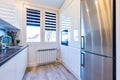 Fitted kitchen in small new apartment, Royalty Free Stock Photo