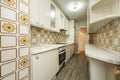 fitted kitchen with vintage kitsch designer tiles white wood countertop