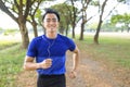 Fittness Young man jogging in the city park Royalty Free Stock Photo