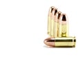 Five 9mm bullets on white Royalty Free Stock Photo