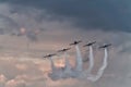 Five airplanes formation at an air show