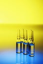 Five ampoules. Conceptual image