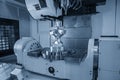 The five axis machining center cutting the mechanical parts with the solid ball endmill tools. Royalty Free Stock Photo