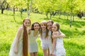 Five beautiful young girls in white dresses in summer Royalty Free Stock Photo