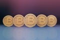Five Bitcoins Virtual Currencies in blue and pink background
