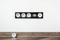 Five black white sockets in the white wall Royalty Free Stock Photo