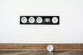 Five black white sockets in the white wall Royalty Free Stock Photo