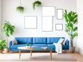 Five blank frames mockup for artwork or print on white wall with blue couch eucalyptus green plants in vase, copy space. Interior Royalty Free Stock Photo