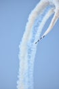 Five blue angel jets flying in a loop