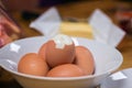 Five boiled eggs in a white plate