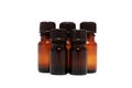 Five bottles of aromatherapy oils isolated Royalty Free Stock Photo