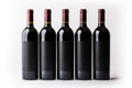 Five bottles of red wine isolated on white background. Mockup Royalty Free Stock Photo