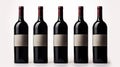 Five bottles of red wine isolated on white created with Generative AI. Elegant wine bottles.