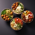 Five bowls filled with different kinds of salads and vegetables on a black table top view, close-up, food, healthy food