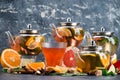 Five brewed teas in teapots collection Royalty Free Stock Photo