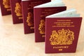 Five British United Kingdom European Union Biometric passports s Royalty Free Stock Photo